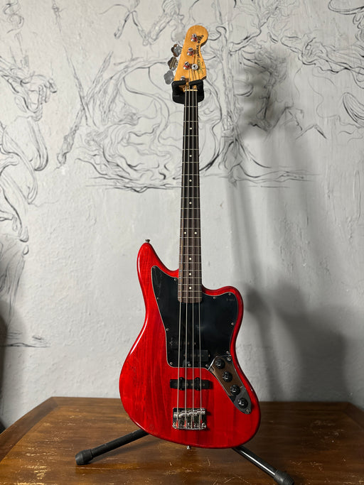 Squier Jaguar Bass Crimson Red Transparent