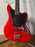 Squier Jaguar Bass Crimson Red Transparent