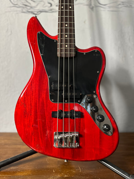 Squier Jaguar Bass Crimson Red Transparent